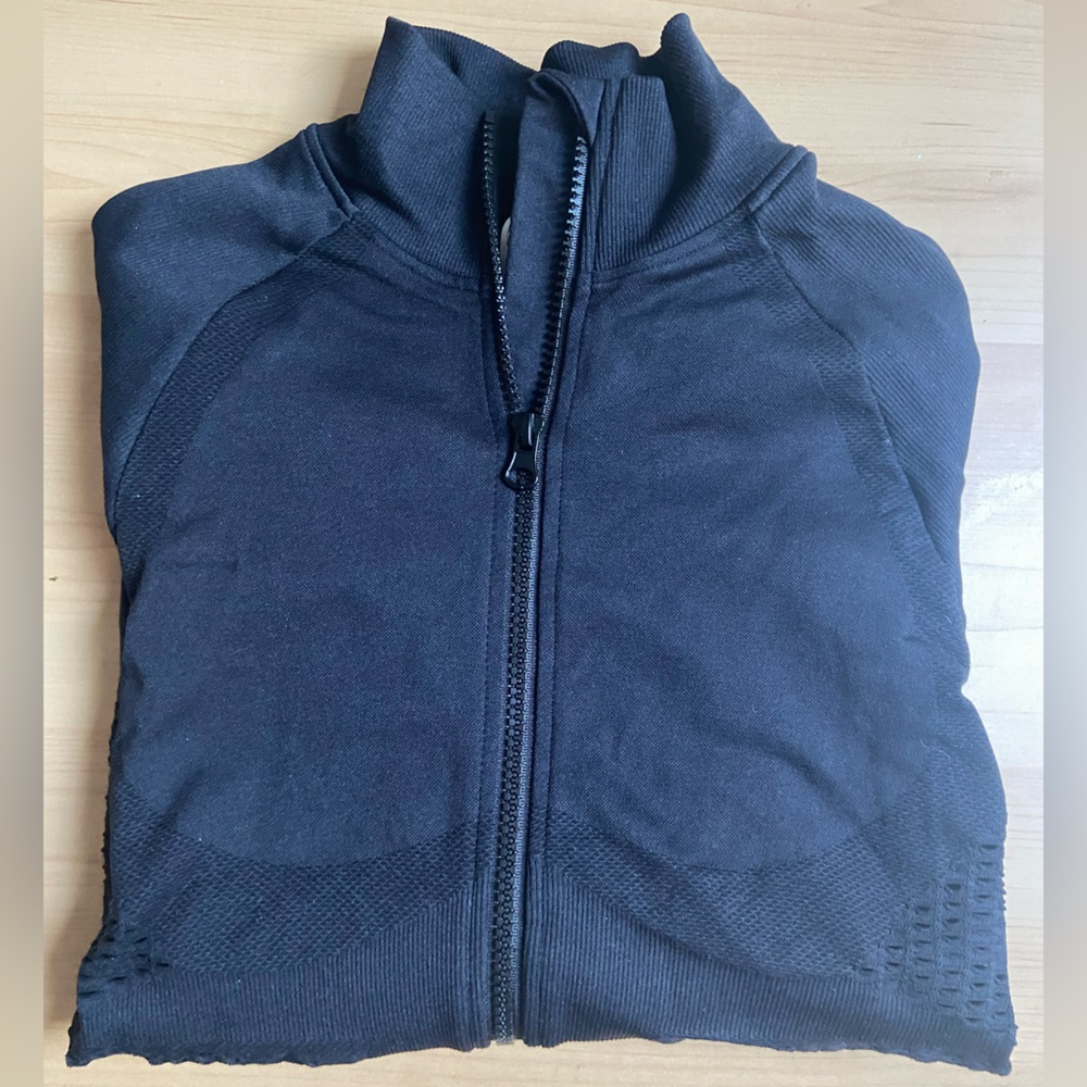 Women’s black athletic zip up